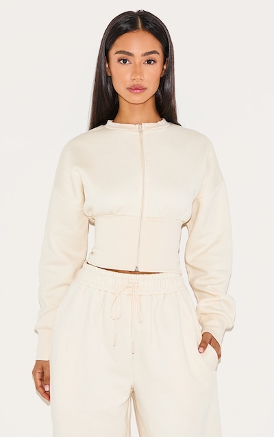 Petite Sweat crème à zip et ourlet élastique