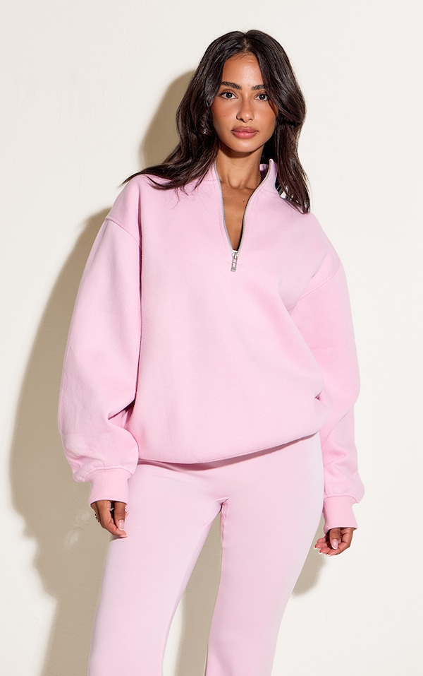 Petite Sweat rose tendre à col entonnoir et zip