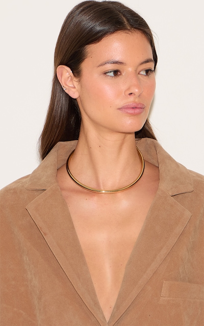 Collier ras-de-cou en barre de métal dorée