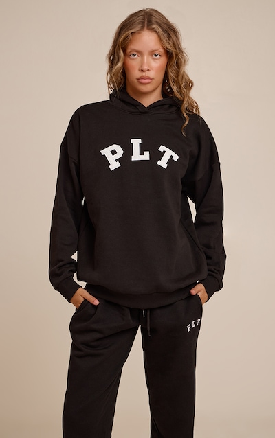 Hoodie oversize noir profond à logo "PLT" contrasté
