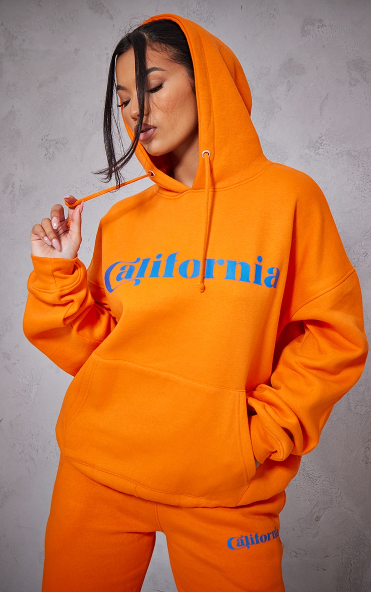bold orange hoodie