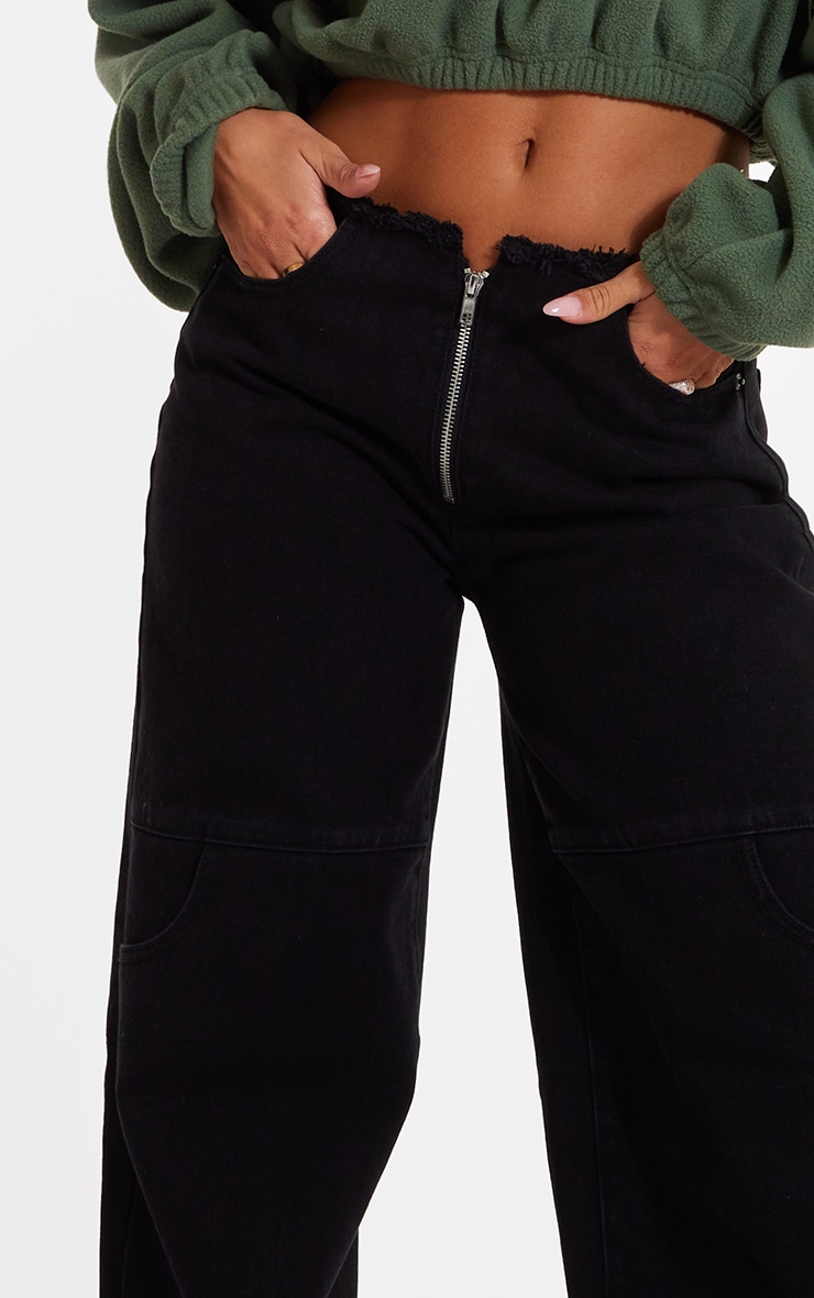 Jean large noir délavé à bande sur la taille élimée | PrettyLittleThing FR