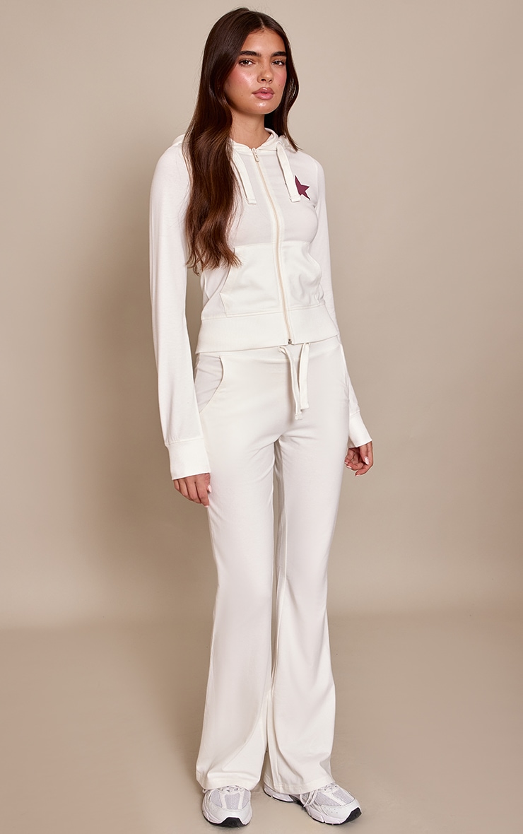 Cream Star Print Skinny Flared Trousers image 2