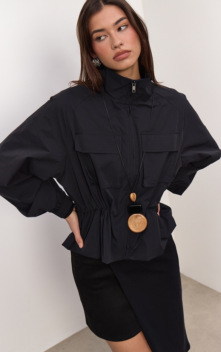 Black Cinch Waist Pocket Detail Rain Coat image 1