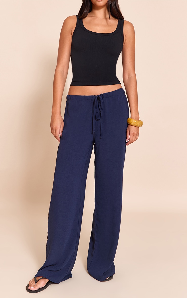 Pantalon fluide bleu marine à taille fine et cordons ajustables image 2