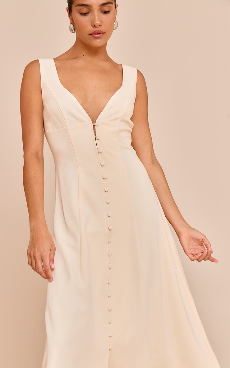 Petite Robe mi-longue crème au beurre à décolleté et boutons image 4