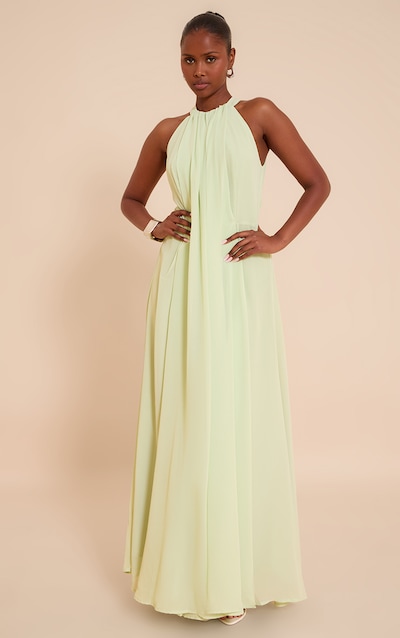Robe longue en mousseline de soie citron vert très plissée