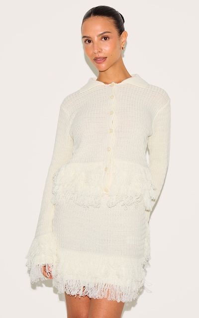 Petite Cardigan crème à boutons et franges