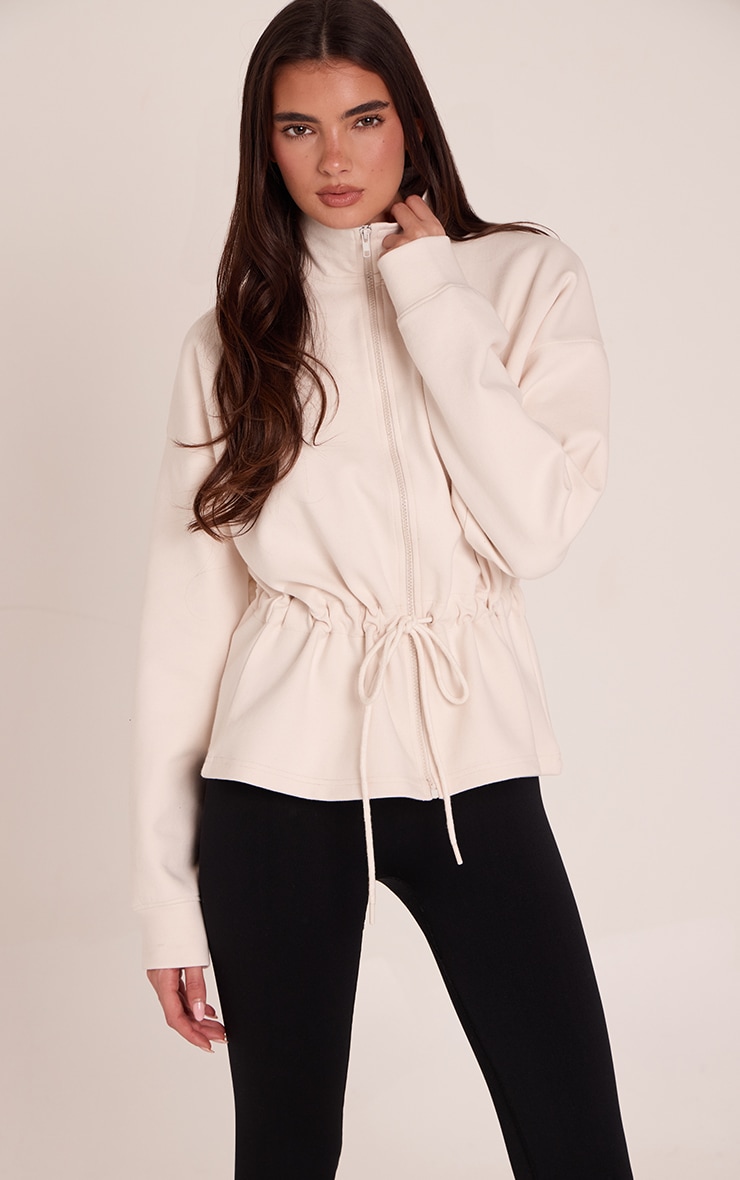 Cream Interlock Peplum Funnel Neck Zip Up Jacket