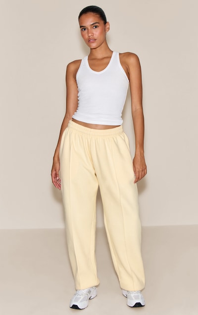 Jogging oversize crème au beurre à pinces et ourlets resserrés