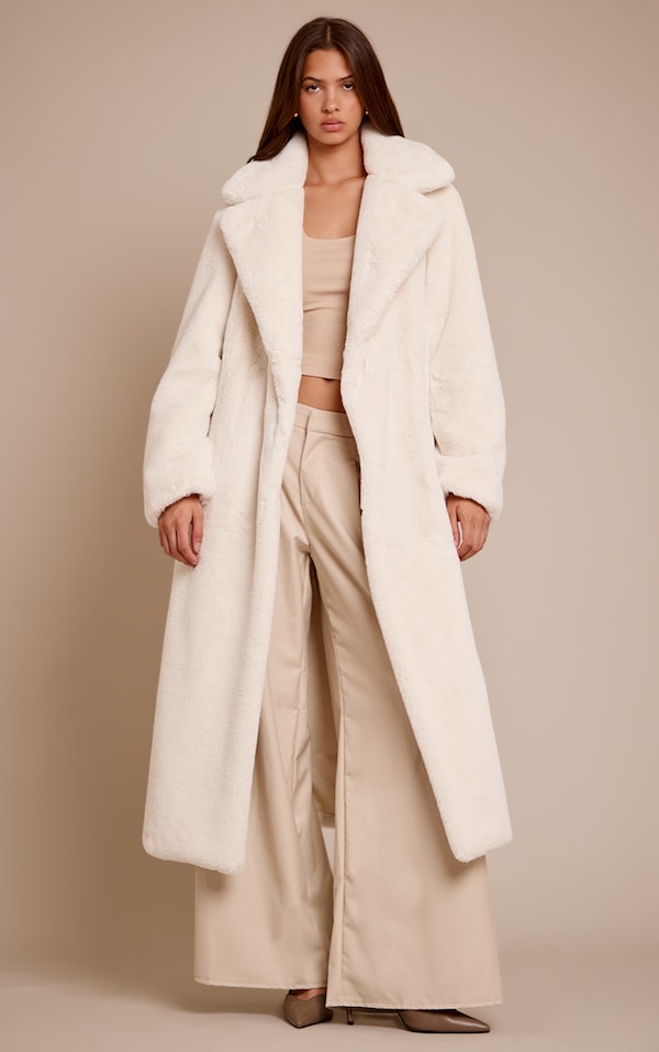 Manteau long en fausse fourrure crème à taille nouée