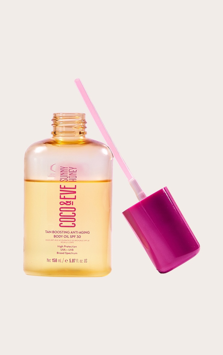Coco & Eve Sunny Huile corporelle anti-âge booster de bronzage Sunny Honey FPS 30 image 1