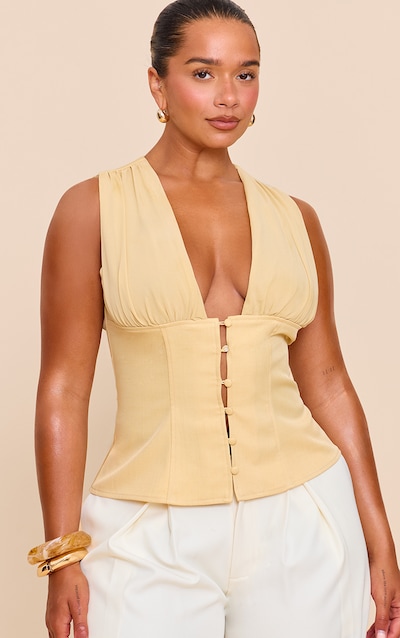 Shape Top jaune beurre à décolleté et boutons