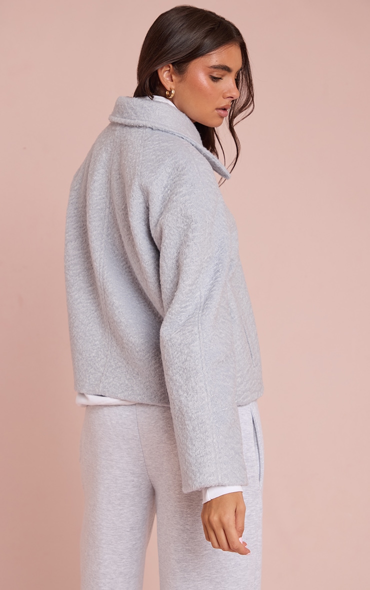 Veste bouclée bleu clair à zip image 2