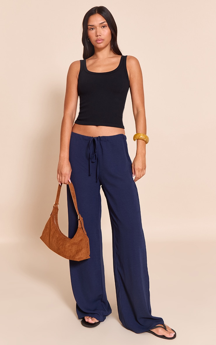 Pantalon fluide bleu marine à taille fine et cordons ajustables image 1