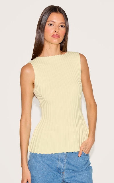 Top péplum en maille tricot jaune citron à col bateau