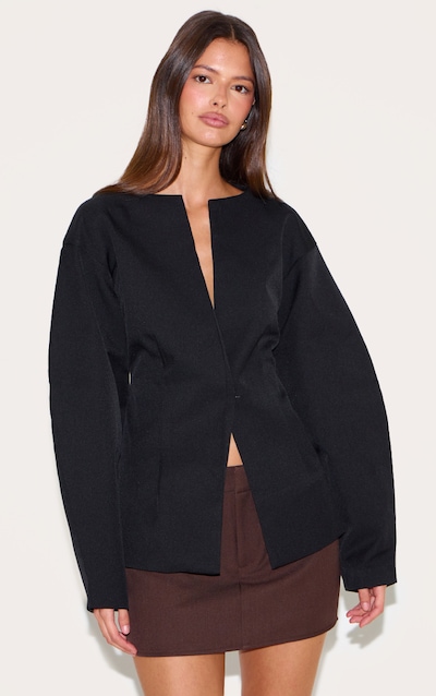 Blazer noir à manches cocon et taille cintrée
