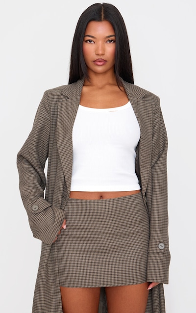 Micro jupe kaki à carreaux et taille basse