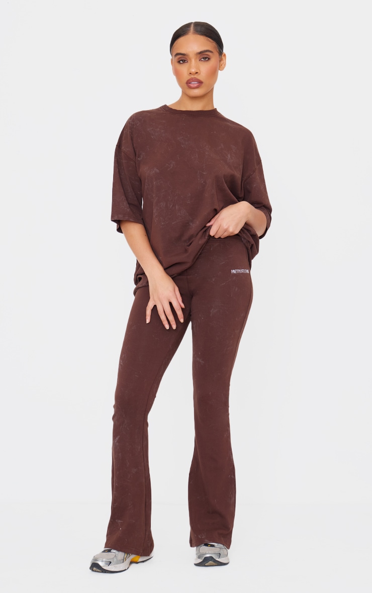 PRETTYLITTLETHING Chocolate Print Washed High Waist Flared Trousers