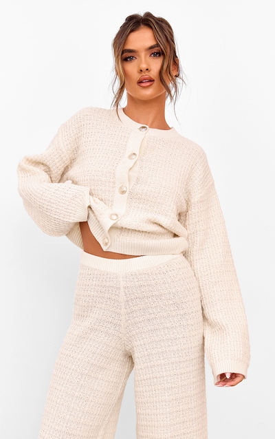 Cardigan en maille tricot bouclé crème à boutons