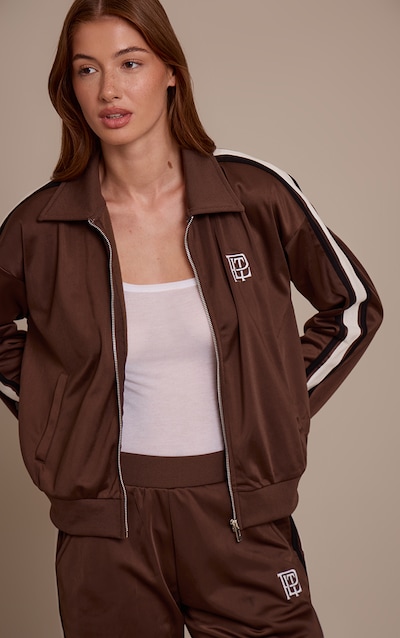 Veste espresso à zip et rayures contrastantes sur les côtés