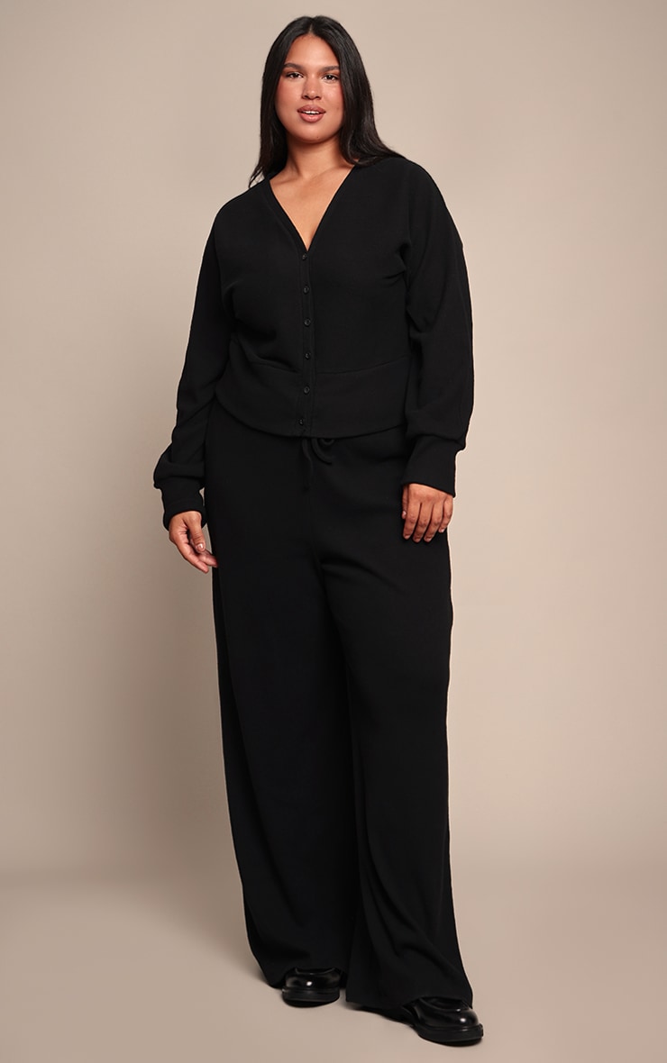Plus Black Soft Ribbed Low Rise Wide Leg Trousers image 1