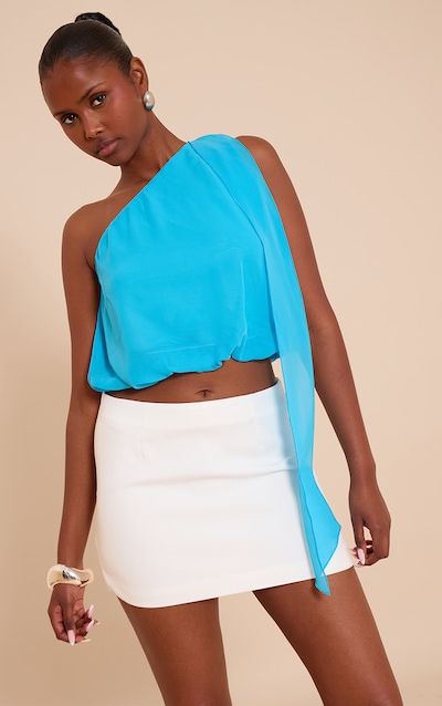 Top bouffant en mousseline de soie turquoise à détail foulard