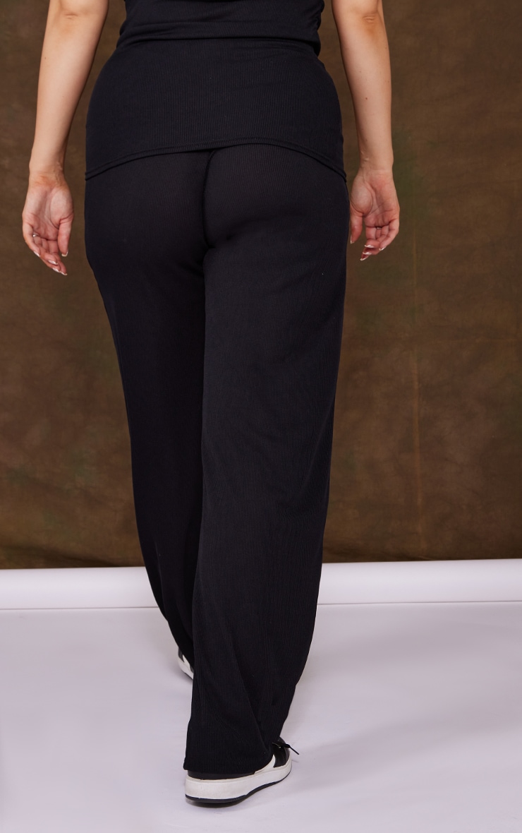 Maternit?� Pantalon grossesse ?�vas?� c?�tel?� bross?� noir taille | PrettyLittleThing FR