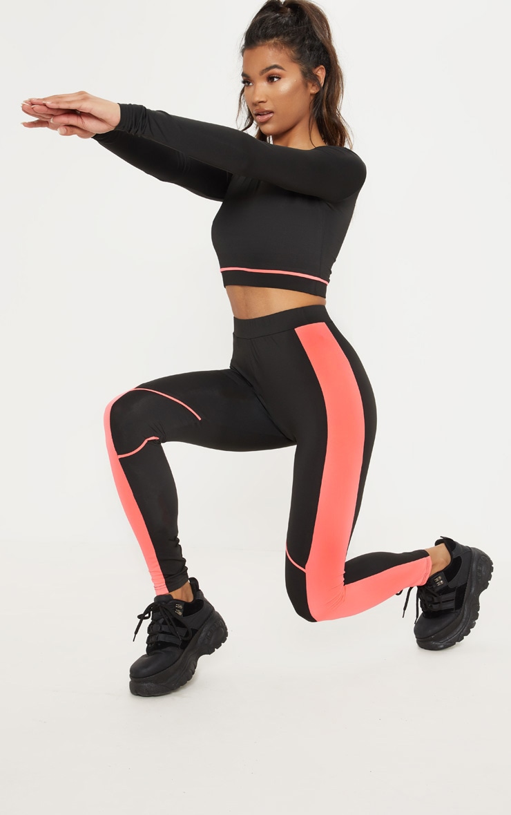 Legging sport noir à bandes et coutures colorées