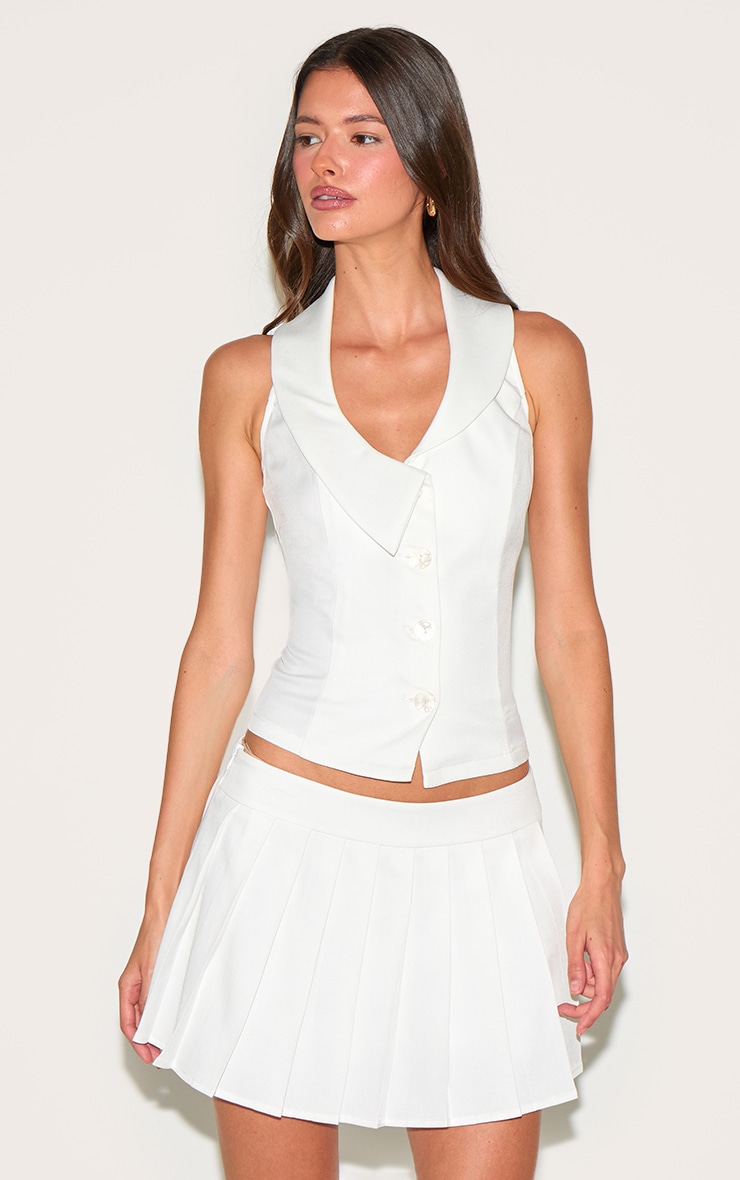 Gilet blanc à col replié et boutons image 1