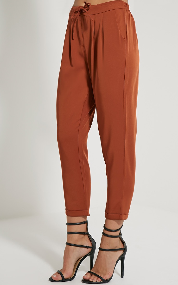 Hanya Rust Casual Trousers | Trousers | PrettyLittleThing USA