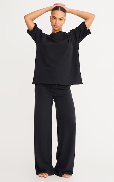 Pantalon droit doux deluxe noir à taille basse et cordons ajustables