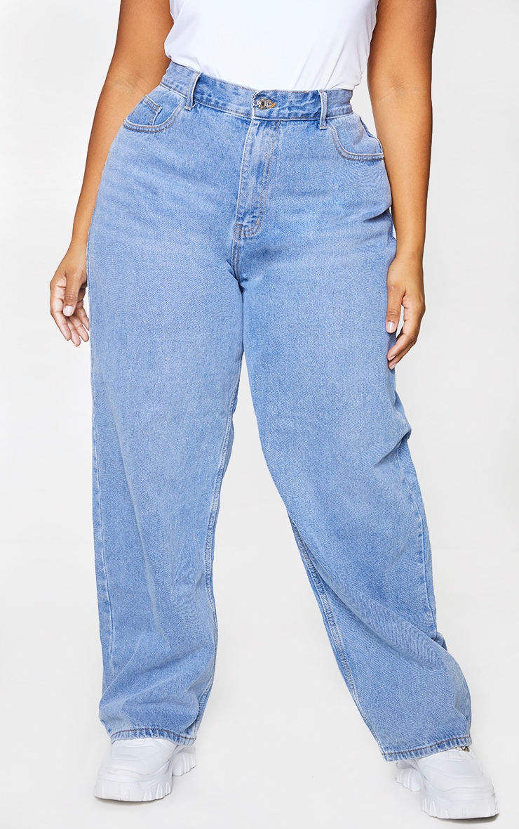 mid wash blue jeans