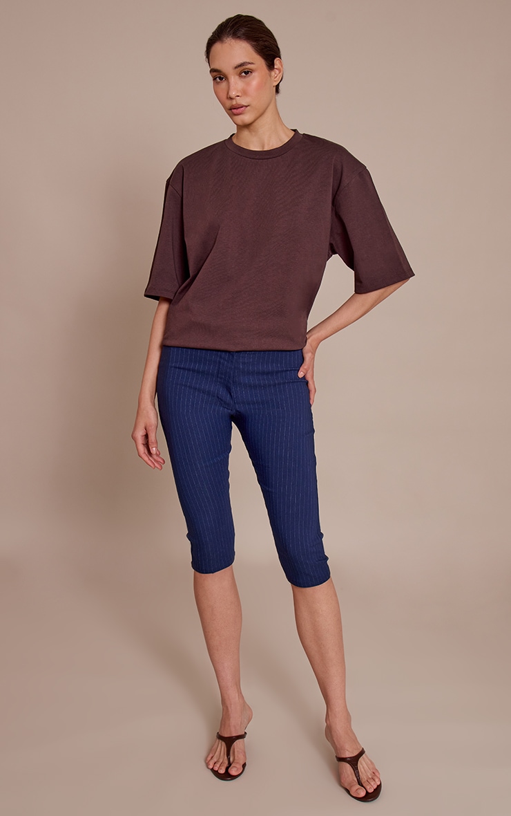 Pantalon capri tissé stretch à fines rayures et fermeture cachée image 1