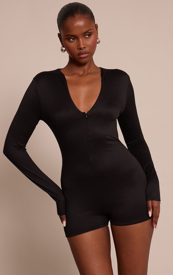 Unitard noire douce au toucher stretch zippée.