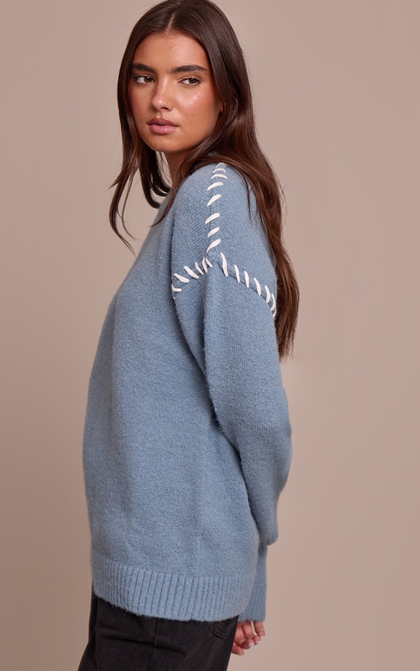 Pull en maille tricot bleu poudré à coutures point droit