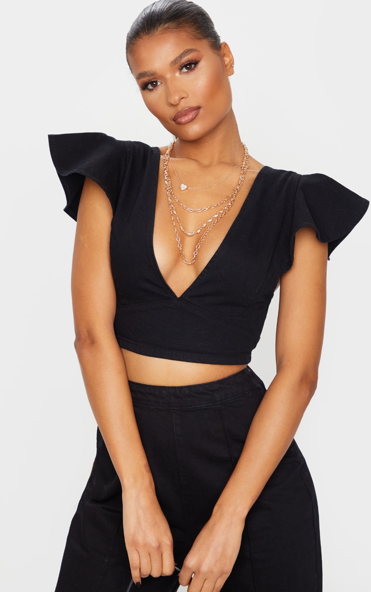 Crop top en jean noir délavé à manches courtes évasées