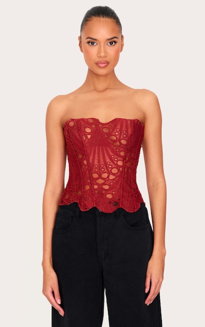 Corset en dentelle texturée orange brûlé transparente fleurie