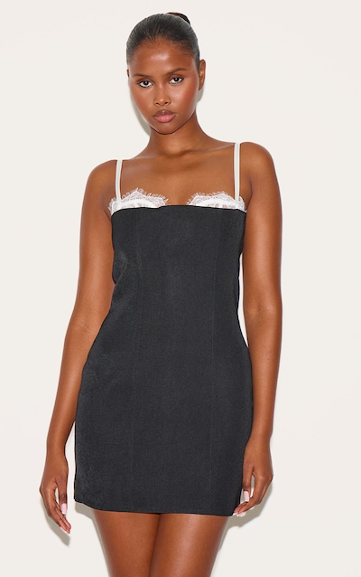 Robe moulante tissée noire à détail en dentelle sur le buste