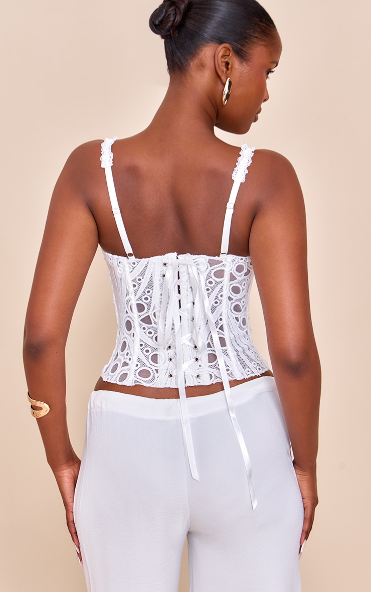 Corset en dentelle texturée blanche transparente fleurie à bretelles fines image 2