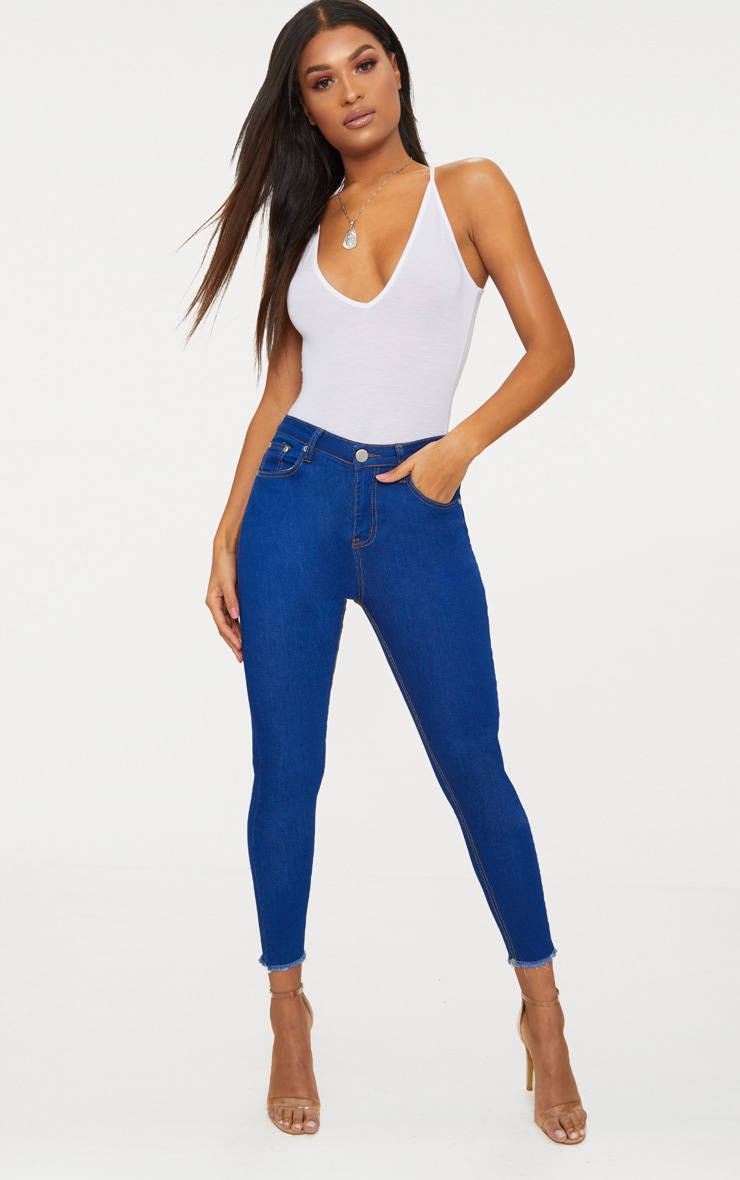 bright blue skinny jeans