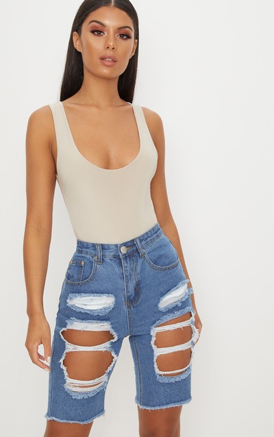 Ripped Shorts Distressed Shorts Prettylittlething Usa Check out our ripped jean shorts selection for the very best in unique or custom, handmade pieces from our there are 536 ripped jean shorts for sale on etsy, and they cost $36.83 on average. mid wash extreme distressed denim bike shorts