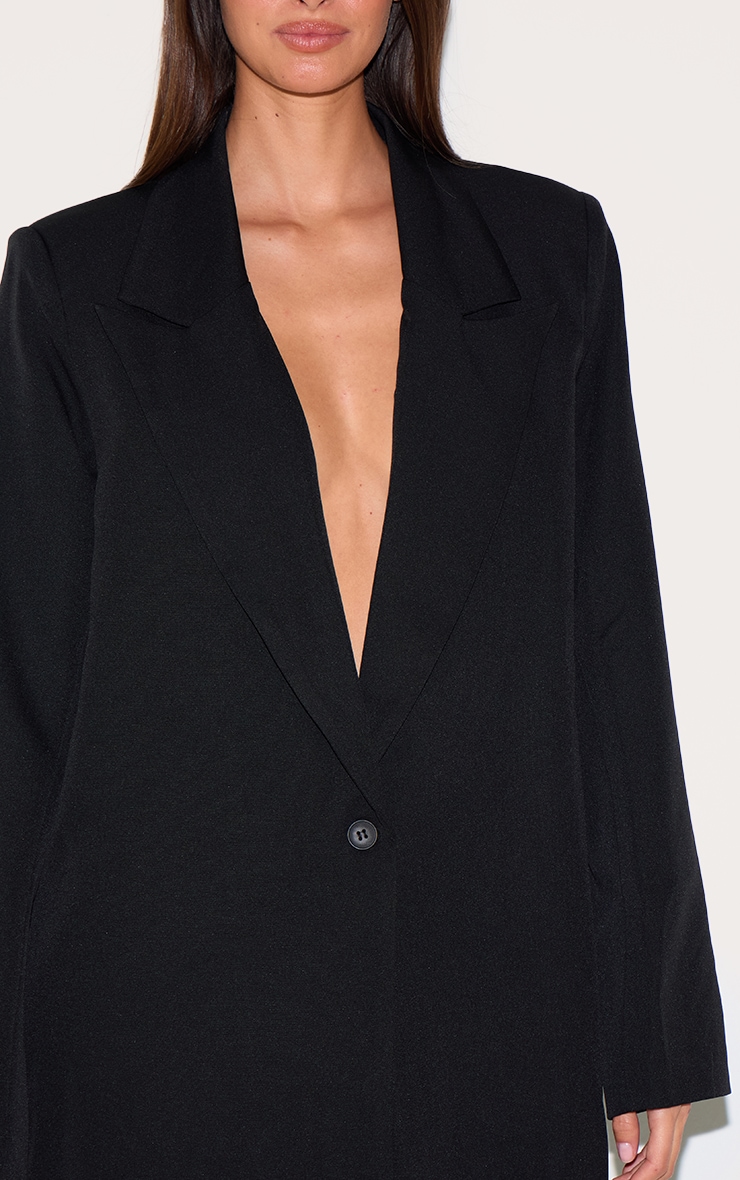 Blazer oversize noir à détail bouton image 4