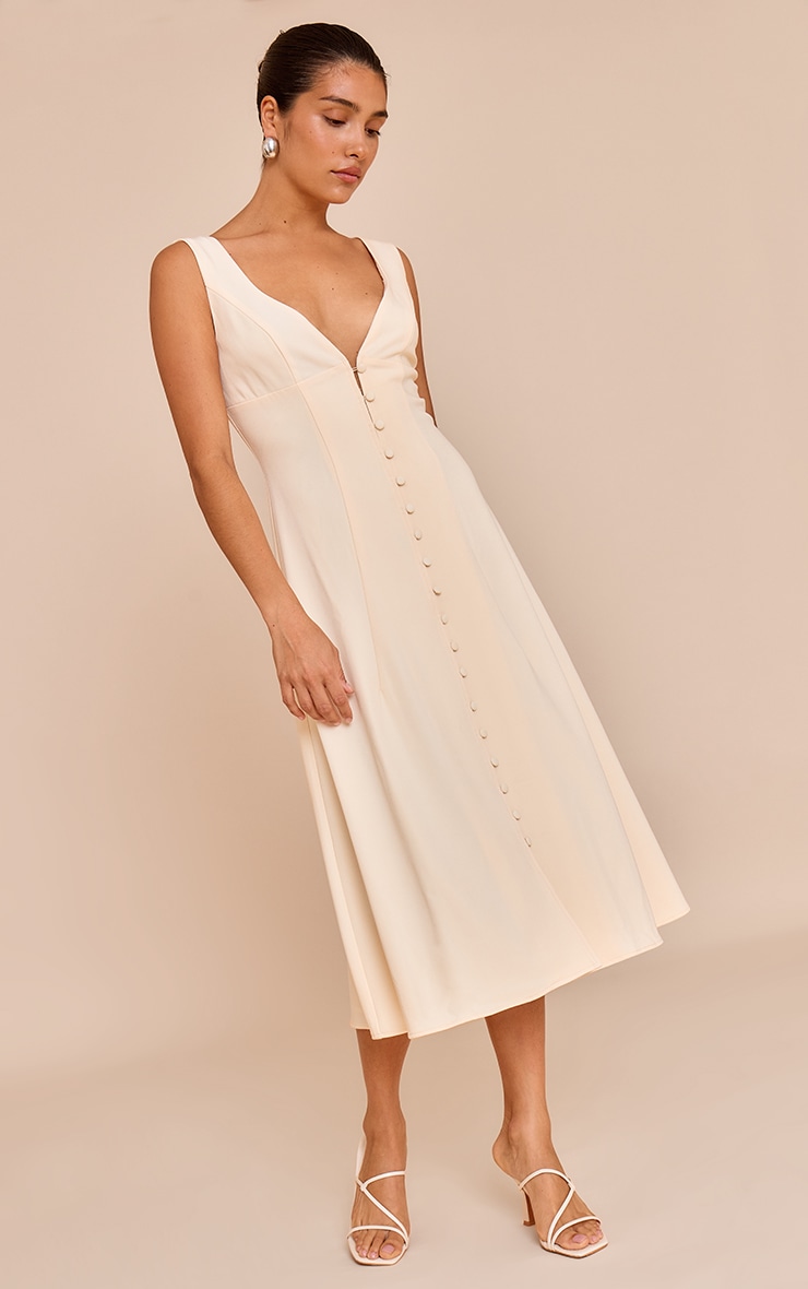 Petite Robe mi-longue crème au beurre à décolleté et boutons image 3