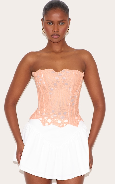 Corset diaphane texturé pêche en dentelle florale