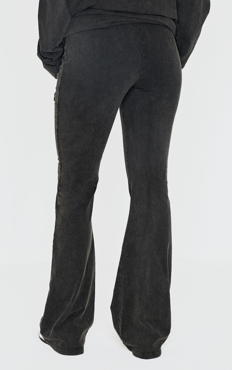 PRETTYLITTLETHING Black Embossed Logo Washed Skinny Flare Pants image 3
