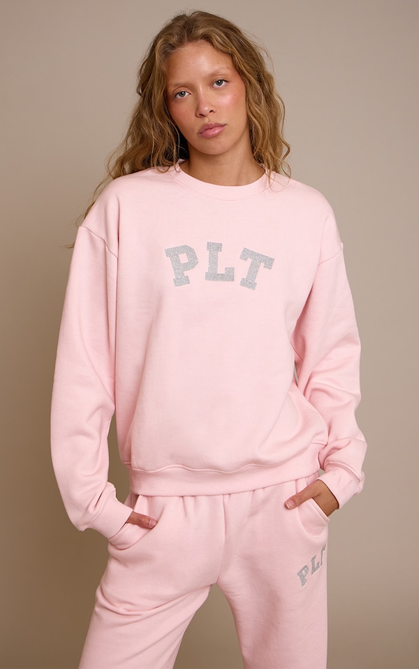 PLT Sweat pullover rose à logo pailleté