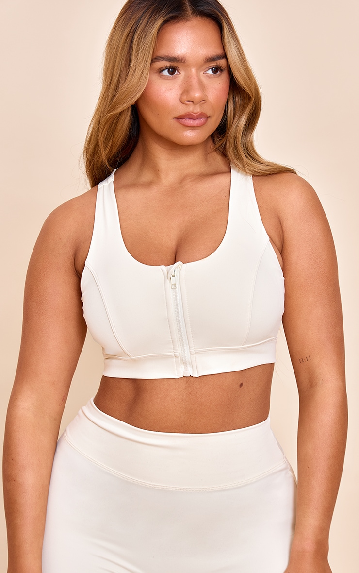 Shape Butter Cream Active Sculpt Zip Front Cupped Sports Bra image 1