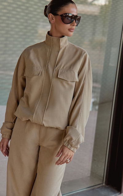 Veste en peau de pêche sable à col montant et zip
