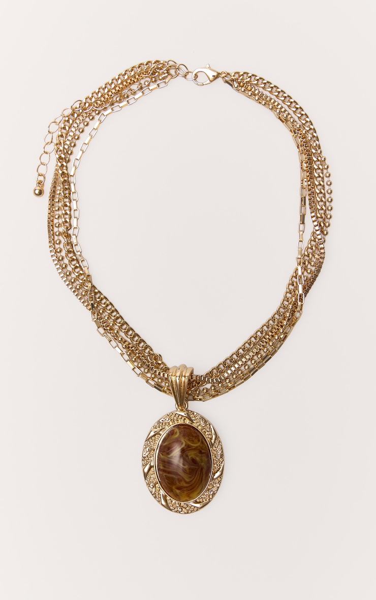 Collier superposé doré à pendentif en résine marron effet fumé image 2